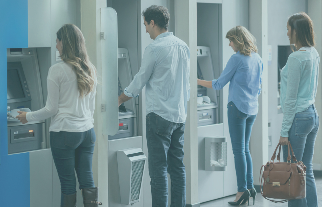 decorative image people standing in front of automated banker machines
