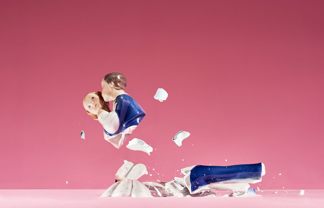 porcelain figurine of a couple kissing smashed into pieces