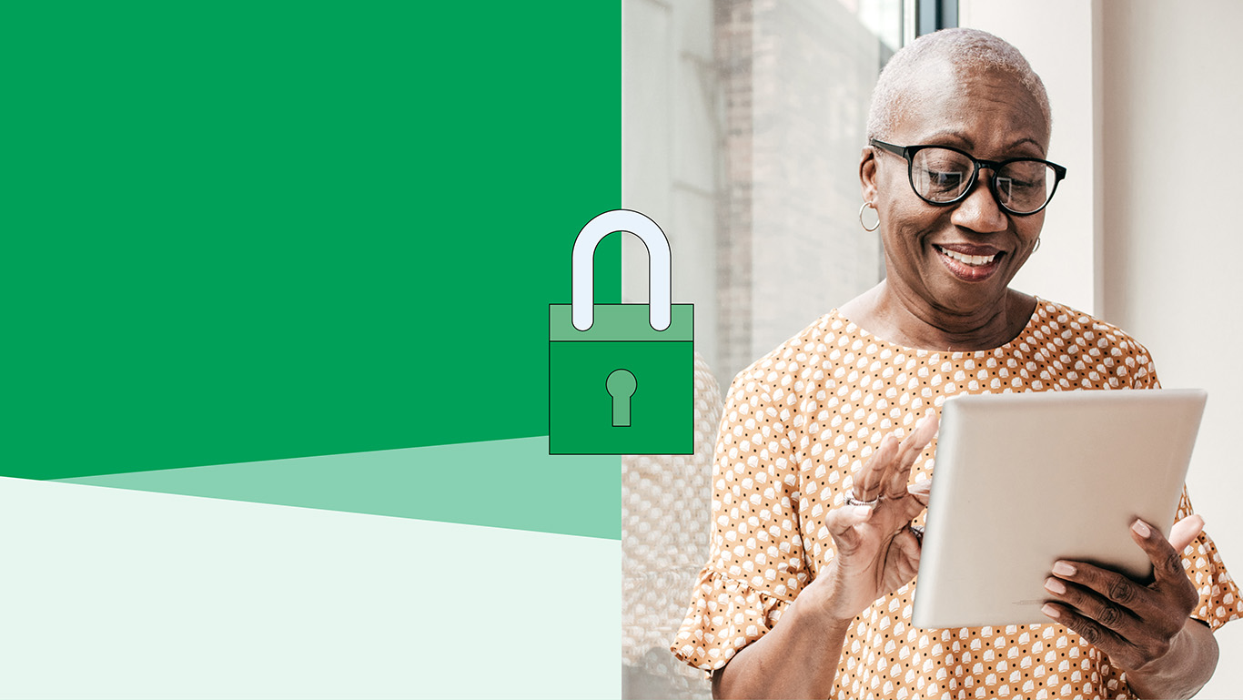 older woman on a laptop with a graphic of a padlock beside